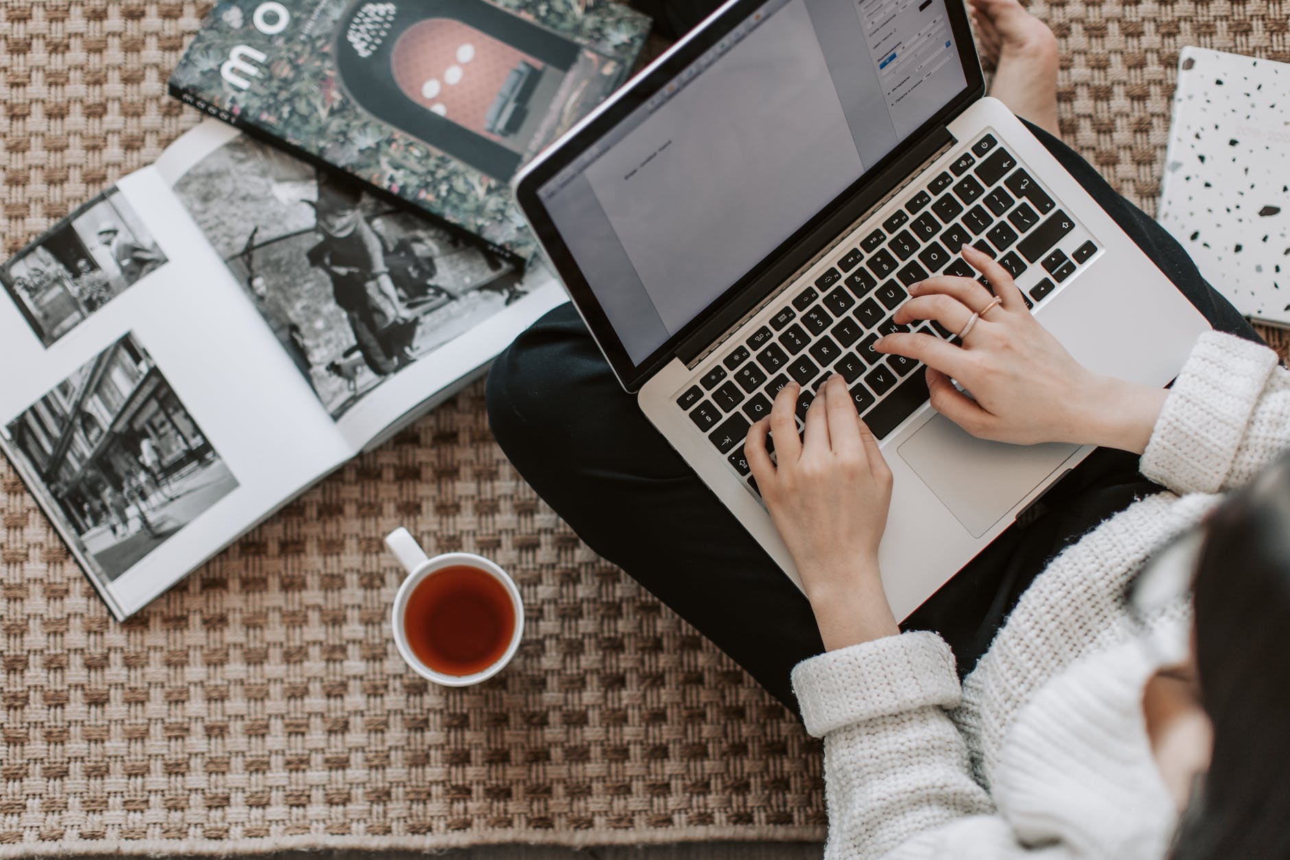 crop young businesswoman using laptop while drinking tea at home: How to Add Bullet Points in Word with Keyboard (3-Methods Guide)